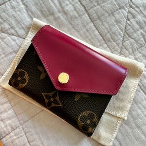 Authentic Louis Vuitton Wallet in Monogram / Fuchsia.